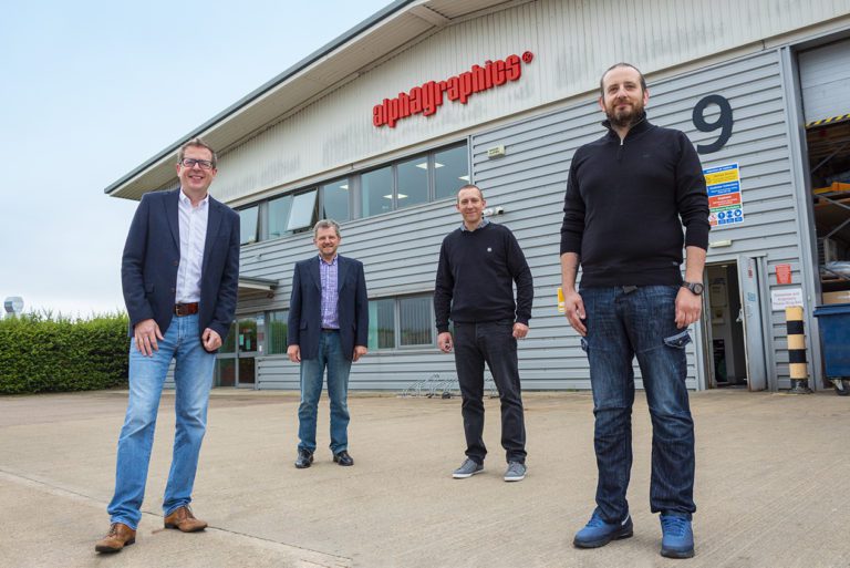 AlphaGraphics acquires key client